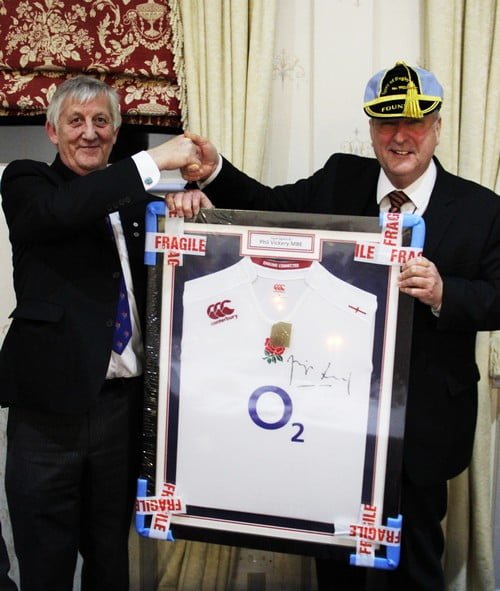 Peter Sparrow receiving his signed shirt from the WM