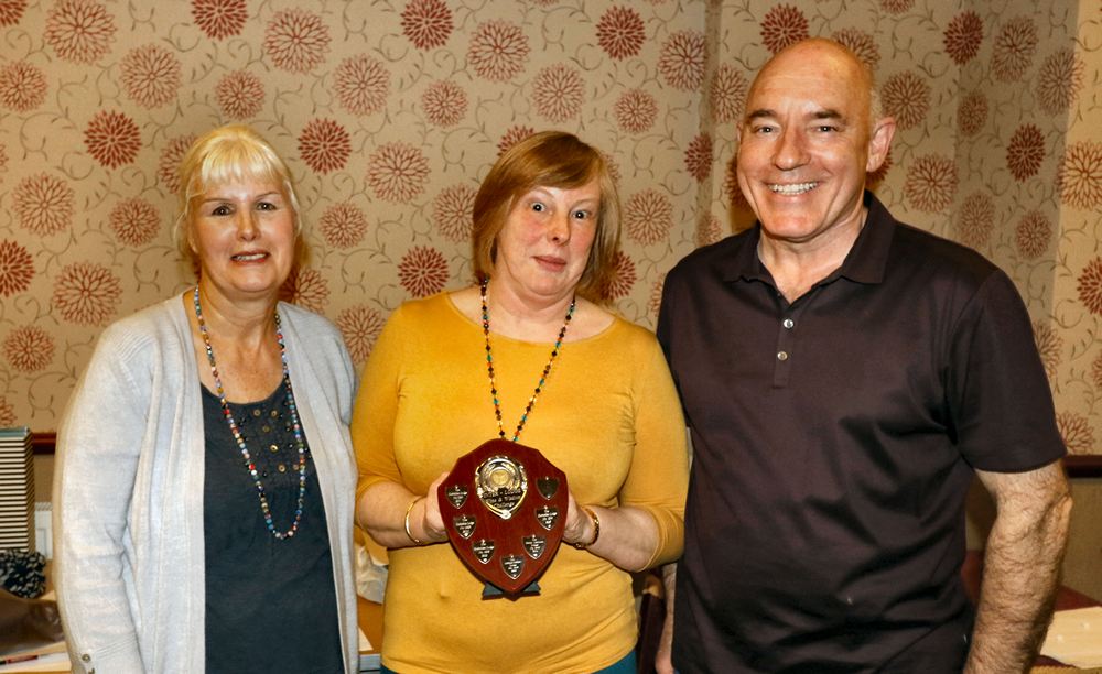 Christine and Frank Robinson with Sue Prescott from the winning team