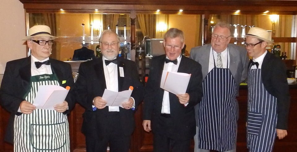 Pictured from left to right, are: Chris Smith, Eric O'Callaghan, John Donnelly, John Cairns and Barry Huxley singing the Stewards song.