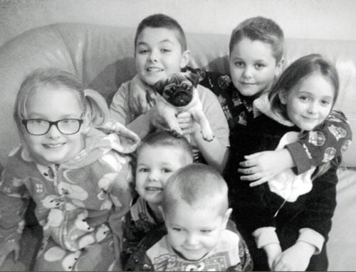 A rare photo of all the children and Doug together! 