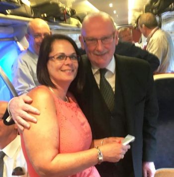 Virgin Trains Stewardess Tracy receiving a retirement gift from the PGM RWBro Alexander Sillars McLaren.
