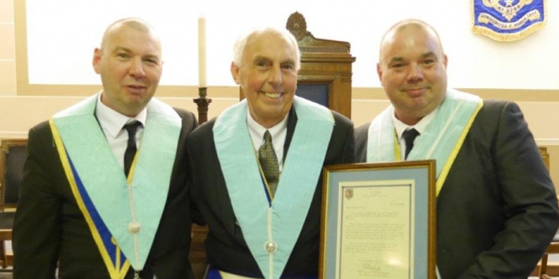 Frederick-J.-Tate-receives-50th-year-long-certificate