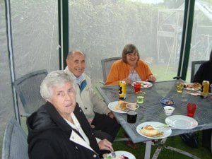 Just-some-of-the-happy-band-of-guests-tucking-into-their-BBQ-food