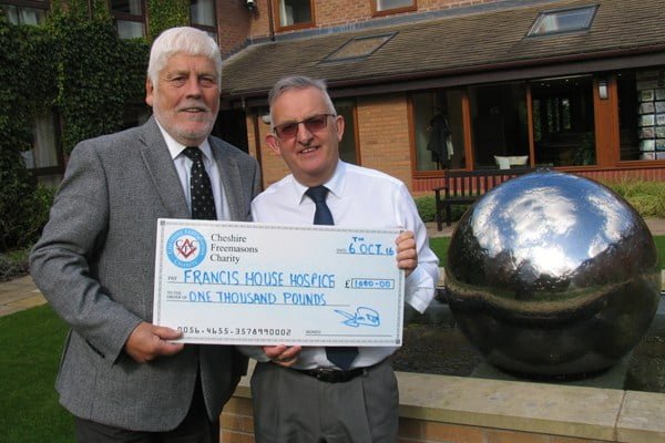 Colin Ross with Rev David Ireland at Francis House Hospice