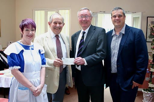 Freemasons donate £1,200 to Palmer Court Sheltered Housing Scheme Photo 17 08 12 palmer WBro John Rivett PAGDC (second from left) receiving the cheque from RWBro Barrie Hall PPGM