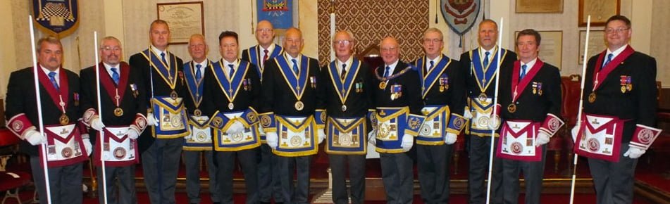 Pictured with Brian and David are the group chairman and vice chairman, accompanied by nine acting Provincial grand officers.