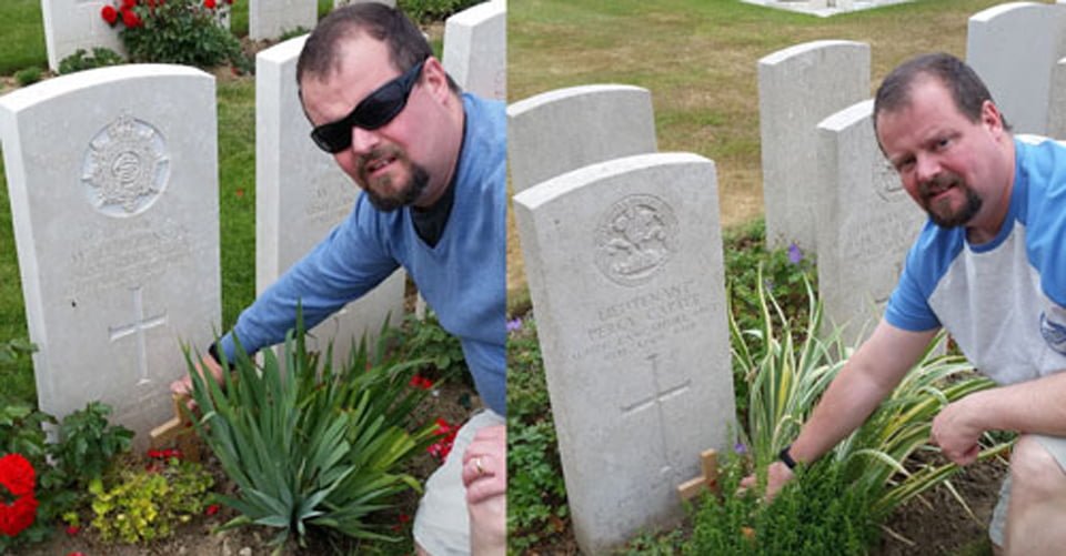 Rob Crook placing the crosses on the graves of William Robinson and Percy Carter.