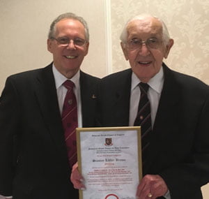 Ian presents Stanley with his certificate to mark his 50 years of Royal Arch membership. Ian presents Stanley with his certificate to mark his 50 years of Royal Arch membership.
