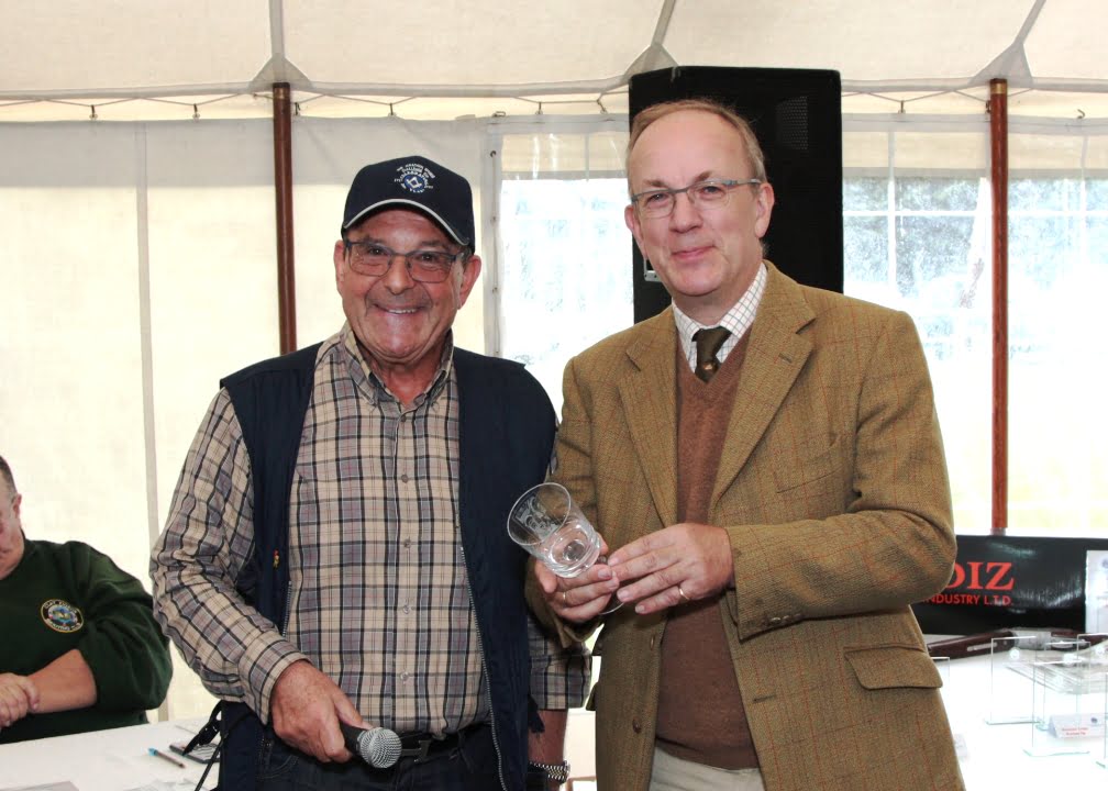 Jonathan Spence receives the engraved wine goblet from Brian Saidman. (Photo courtesy of David Toombs).