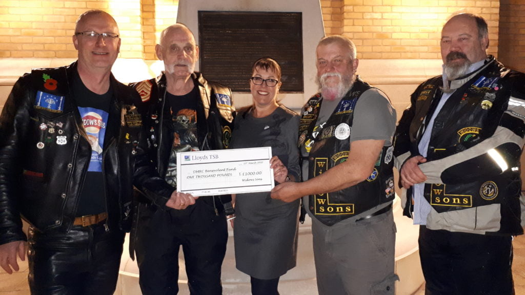 Photo of Presentation of Cheque to the Nicola Norville of the DMRC Benevolent Fund Left to Right WBro Richard Wheelhouse PSGD, Bro Peter Gilbert, Nicola Norville, WBro John Perridge PPSGD, WBro Colin Brink