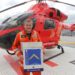 Pictured here is Manxman and Medical Director of London’s Air Ambulance, Dr Gareth Davies, on the landing pad at the Royal London Hospital, after being presented with a blow-up of the stamp and a donation of £1500 from Barbican Lodge, which is featured on one of the stamps.